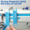 A close-up of a blue sewing machine needle threader with a strong magnetic hold and ruler, demonstrating its grip.