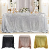 Three draped tablecloths in black, rose gold, and gold glitter sequins for events