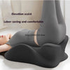 A person lying down wearing a gray ergonomic memory foam wedge pillow for body support.