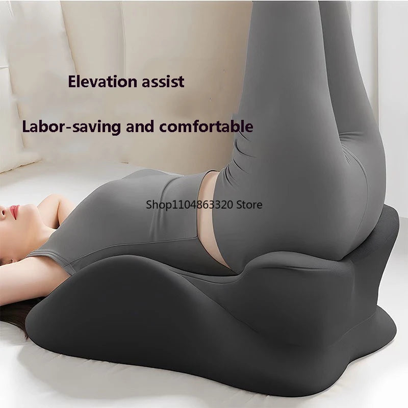 A person lying down wearing a gray ergonomic memory foam wedge pillow for body support.