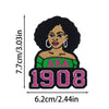 Black embroidered patch featuring a cartoon woman with curly hair and pink accents.