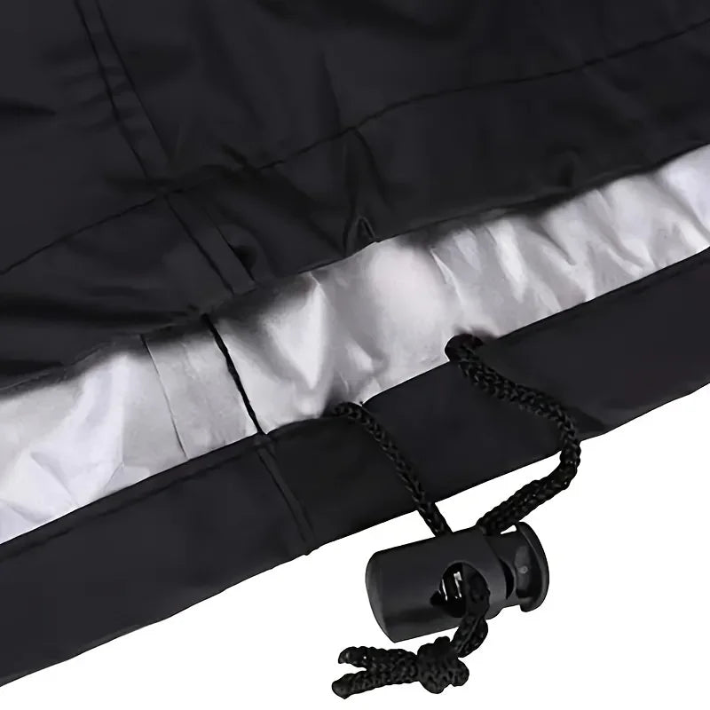 Black heavy duty round grill cover with silver lining and black drawstring