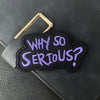 Black embroidered patch with purple text asking Why so serious?