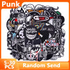 A pile of black embroidered punk patches and pins for DIY clothing