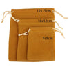 Three velvet drawstring jewelry gift bags in shades of brown and gold.