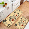 A wooden kitchen mat featuring a heart design and various cutlery icons for kitchen use.