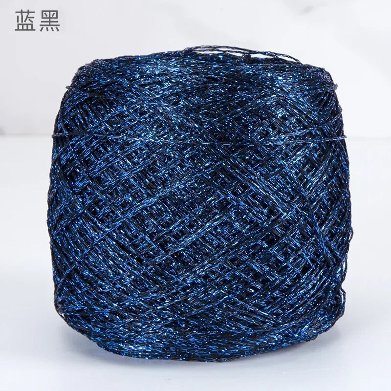 A ball of metallic blue silk yarn used for crocheting and knitting
