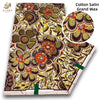 Cotton Satin Grand Wax fabric featuring intricate floral and leaf patterns in earthy tones.