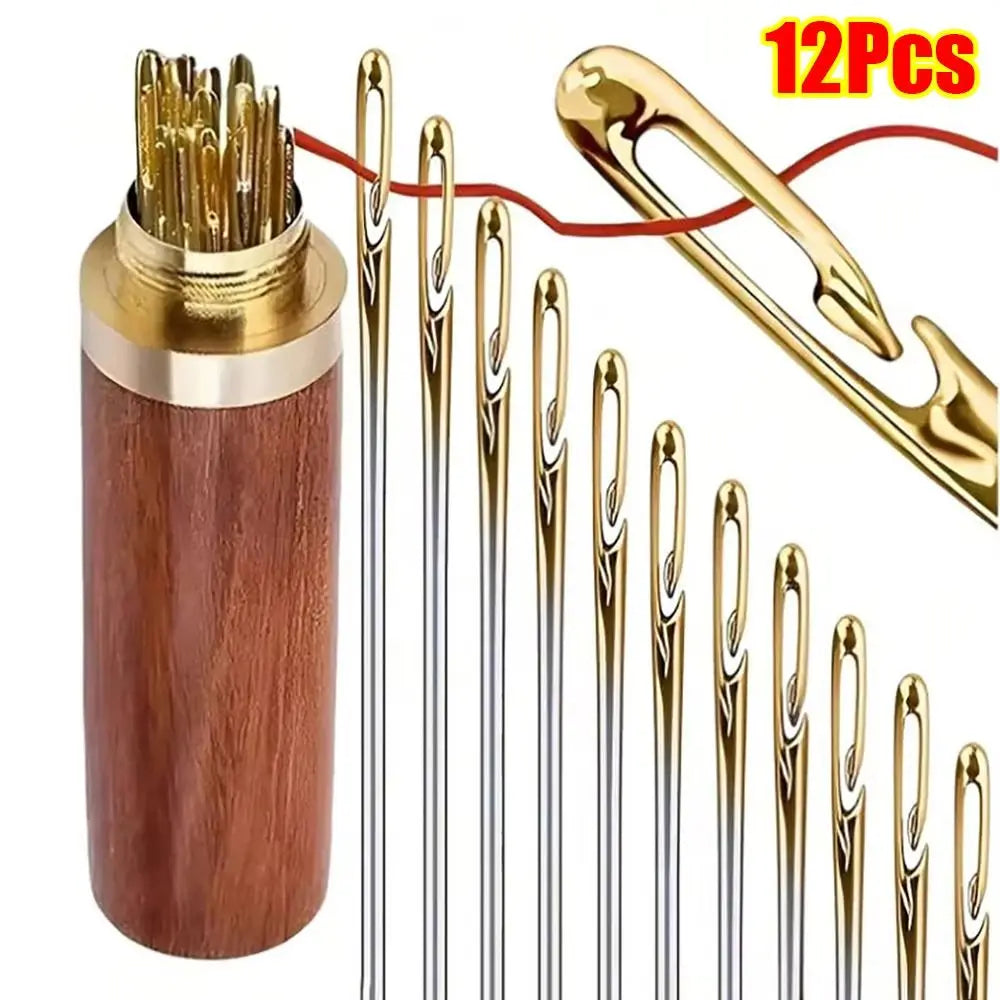 A set of 12 stainless steel self-threading sewing needles with a gold-colored handle and a separate tool.