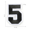 A black number five patch with white edges, measuring 3.6 cm by 5 cm and weighing 0.81g.