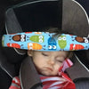 A baby is resting in an adjustable car seat with a colorful head support featuring owl designs.