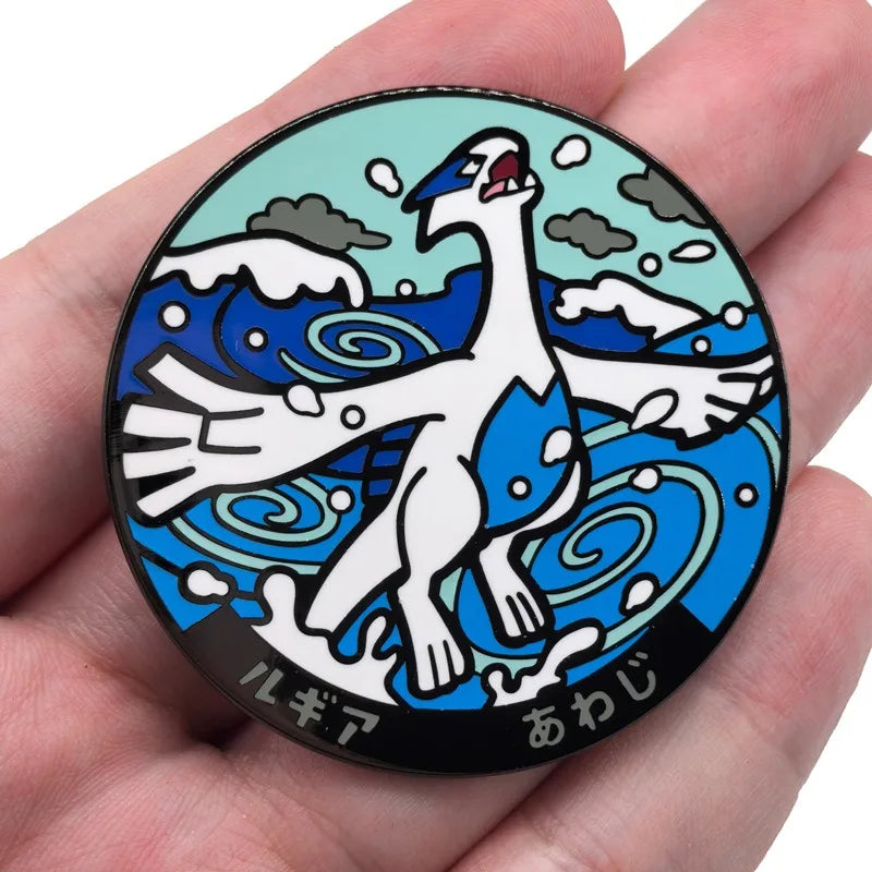 A round metal brooch pin featuring a white divine beast design with blue accents on a teal background.