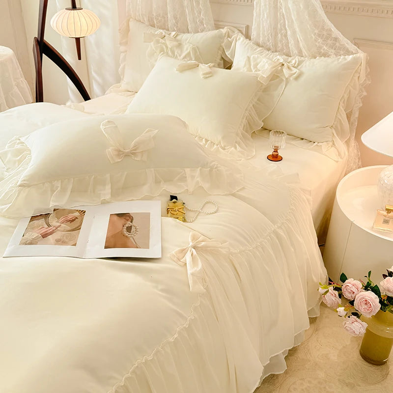 A luxurious white princess chiffon duvet cover set with ruffled details and sheer fabric accents.