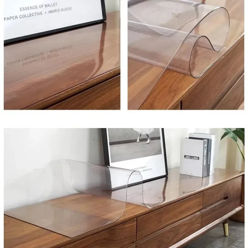 A clear PVC table protector mat is shown on a wooden cabinet surface.