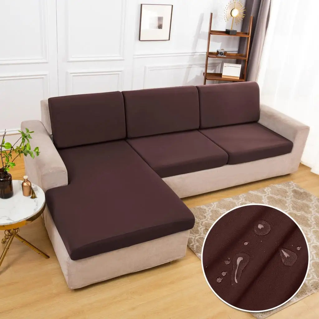 A brown waterproof sofa cushion protector cover is shown on a beige sofa.