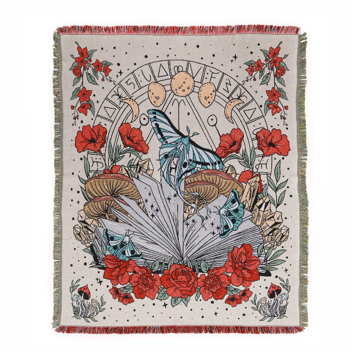 A hand-stitched throw blanket featuring a geometric floral design in red, orange, and earthy tones.