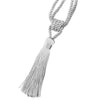 Elegant silver curtain tiebacks with braided cord and long tassels