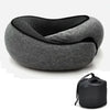 A gray memory foam travel neck pillow with black accents shown from above.