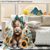 A fluffy brown Highland cow puppy wearing a teal bow is featured on a floral patterned fabric.