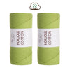 Two spools of light green hand-knitted cotton yarn for DIY crafting