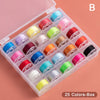 A plastic box containing 25 assorted colored sewing bobbins arranged in a grid.