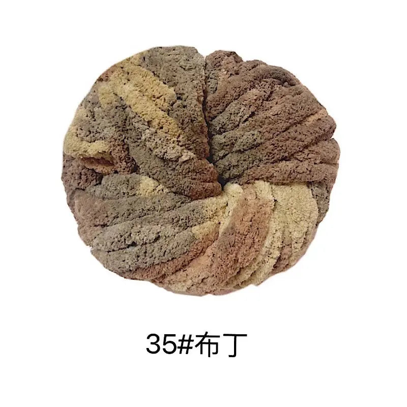 A ball of hand-woven chunky chenille yarn in earthy brown and beige tones.