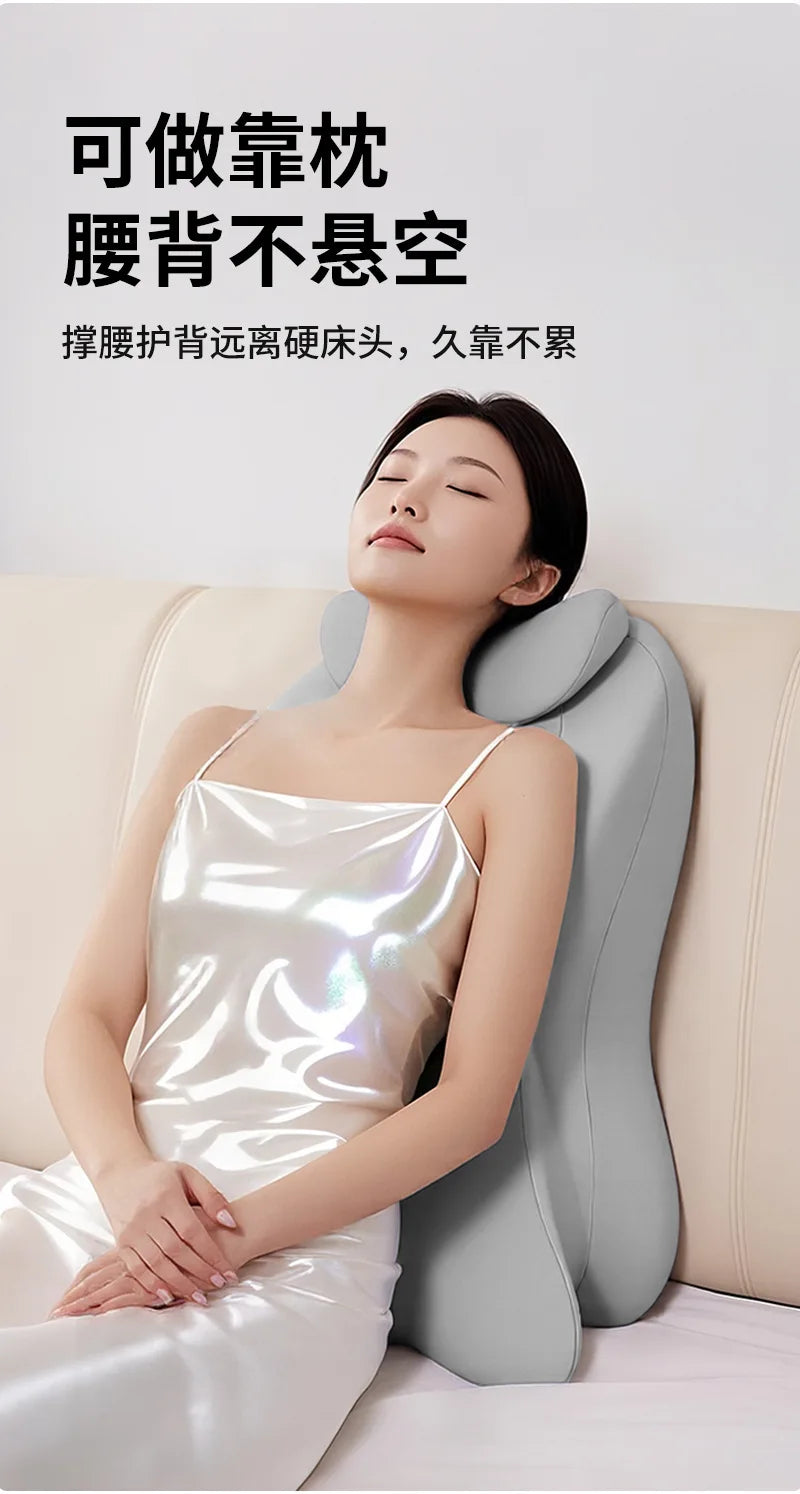 A woman is lying down and using a silver ergonomic memory foam wedge pillow for neck support.