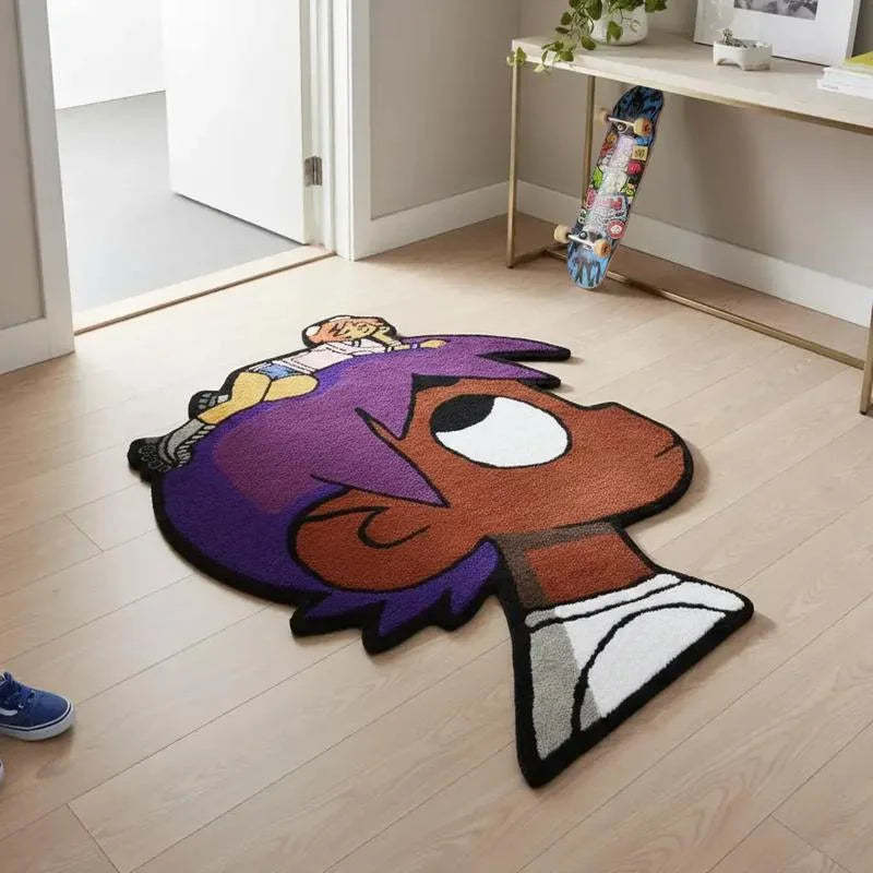 A purple cartoon character plush area rug featuring a stylized face and body, displayed on a light wood floor.