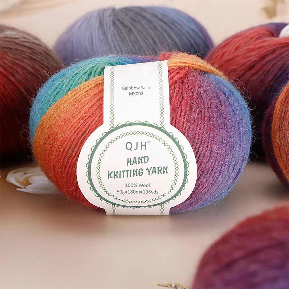 A ball of multi-colored wool yarn with a tag showing the yarn details for knitting and crocheting