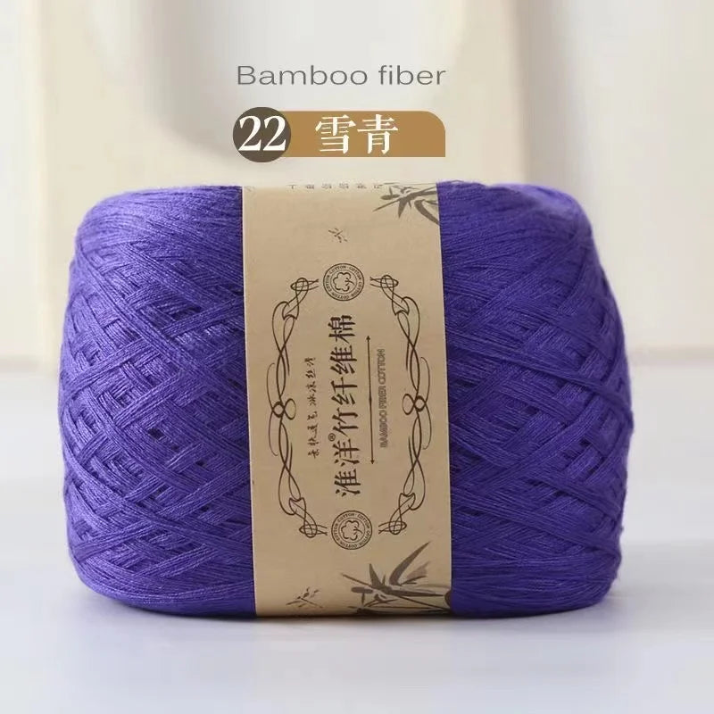 Purple bamboo fiber yarn skein labeled as 22 count for crafting