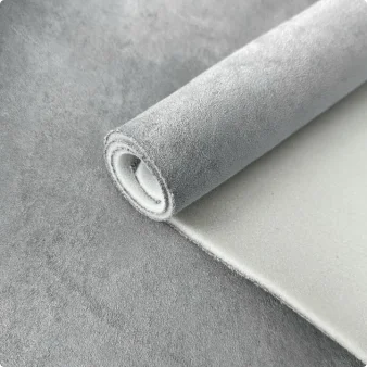 Roll of gray premium suede auto headliner fabric with foam backing