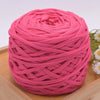 A ball of bright pink craft yarn made of 100% polyester for knitting and DIY projects.