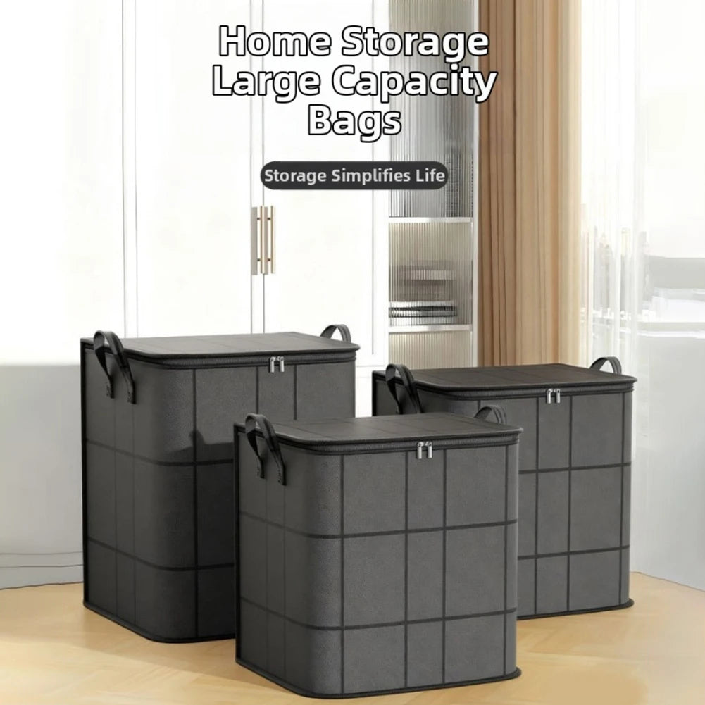 Three large gray storage bags are displayed on a wooden floor next to a window.
