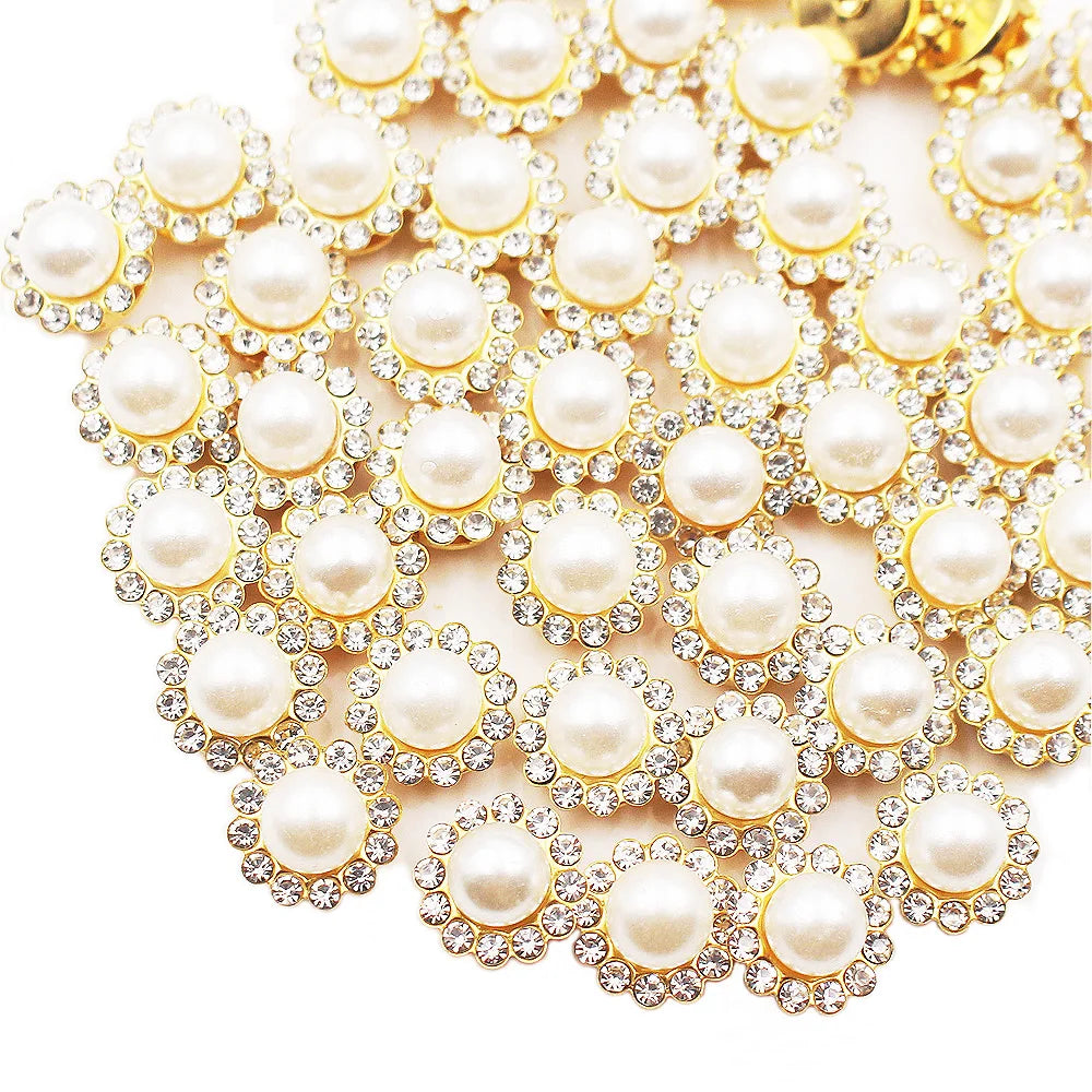 A close-up of sunflower crystal rhinestone sew-on buttons arranged in a decorative pattern.
