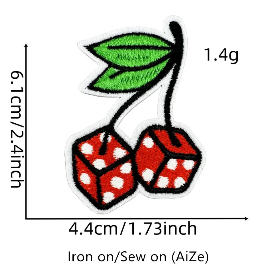 A green leaf and two red fruit patches are shown with dimensions of 6.1cm by 4.4cm.