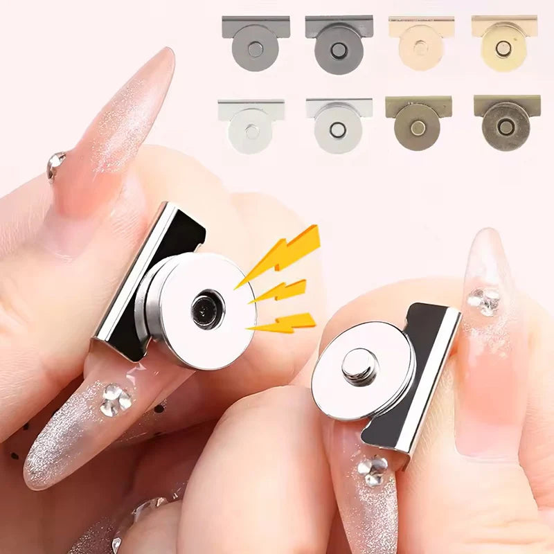 A hand holds several metal seamless magnetic closure buckles in various finishes and sizes.
