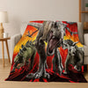 A graphic print of a Tyrannosaurus Rex and Triceratops dinosaurs on a blanket.
