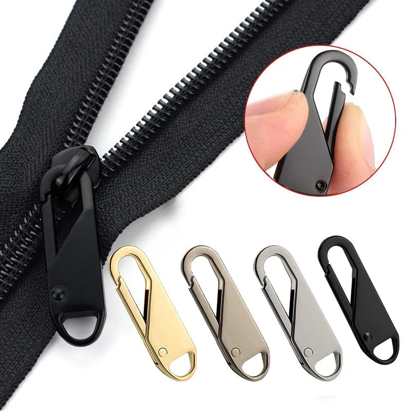 A black zipper with a detachable metal puller kit showing various gold and silver zipper pulls