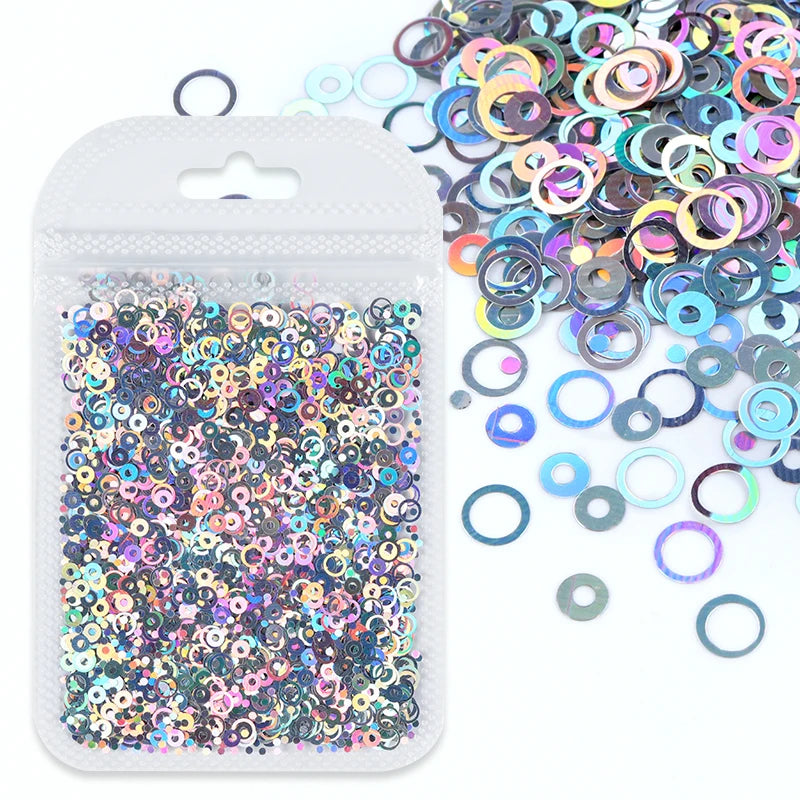 A clear plastic pouch filled with colorful resin glitter filler for epoxy art