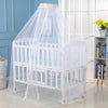 A white foldable baby mosquito net crib canopy with a sheer white netting and yellow trim.