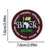 Black embroidered patch with text I AM Block HISTORY and surrounding words on a circular background