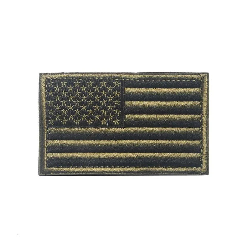 A rectangular patch featuring the design of the USA flag with hook and loop backing.