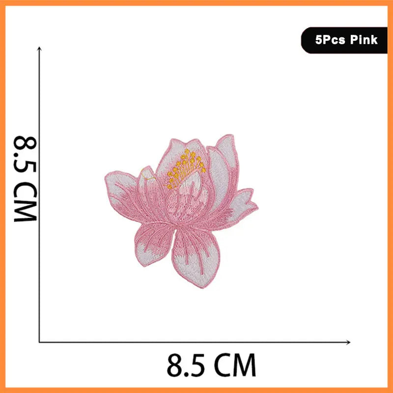 Set of five pink butterfly and rose embroidered iron-on patches.