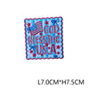 Blue embroidered patch featuring the text GOD BLESS THE USA with stars and patriotic borders