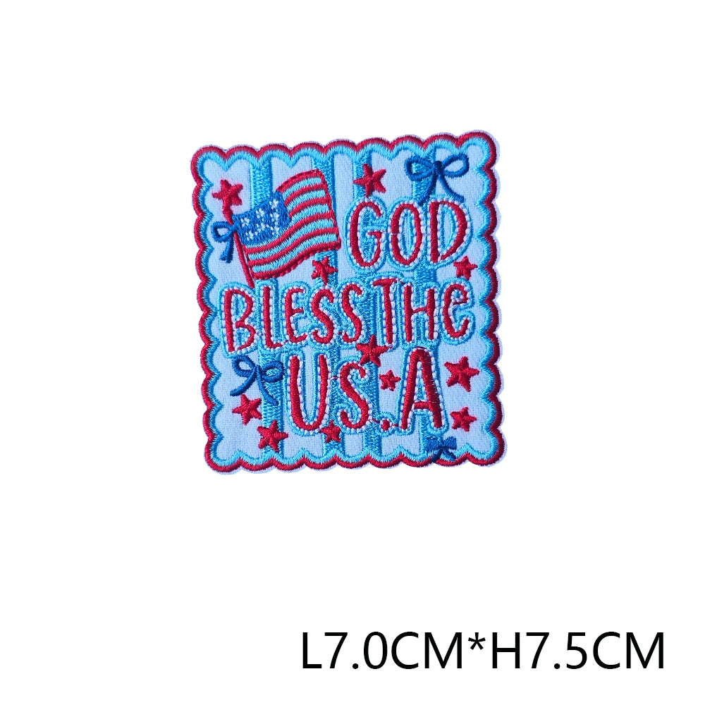 Blue embroidered patch featuring the text GOD BLESS THE USA with stars and patriotic borders