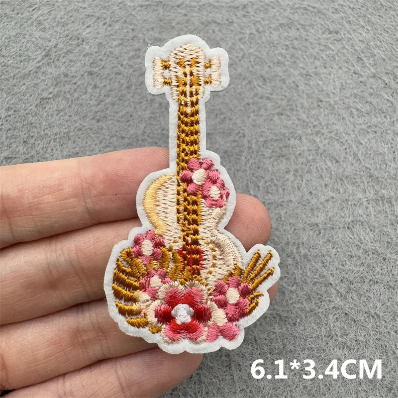Embroidered iron-on patch featuring a detailed Western cowboy theme with floral and decorative elements.