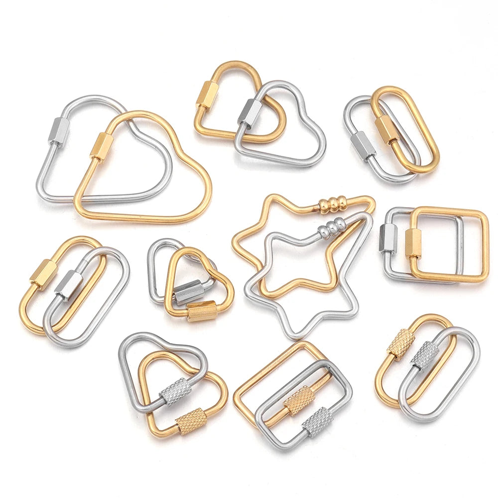 A collection of gold and silver heart-shaped screw lock carabiner clasps for jewelry making.