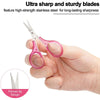 A hand holds a pair of pink precision craft scissors featuring a pointed tip design.