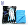 A black package of coral fleece microfiber cleaning cloths and a blue towel are displayed on a white background.