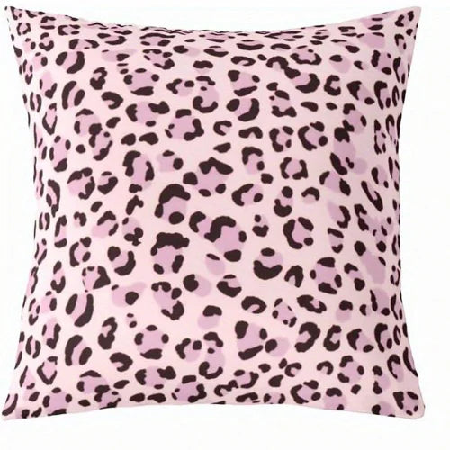 A square decorative pillow cover with a pink leopard print pattern.